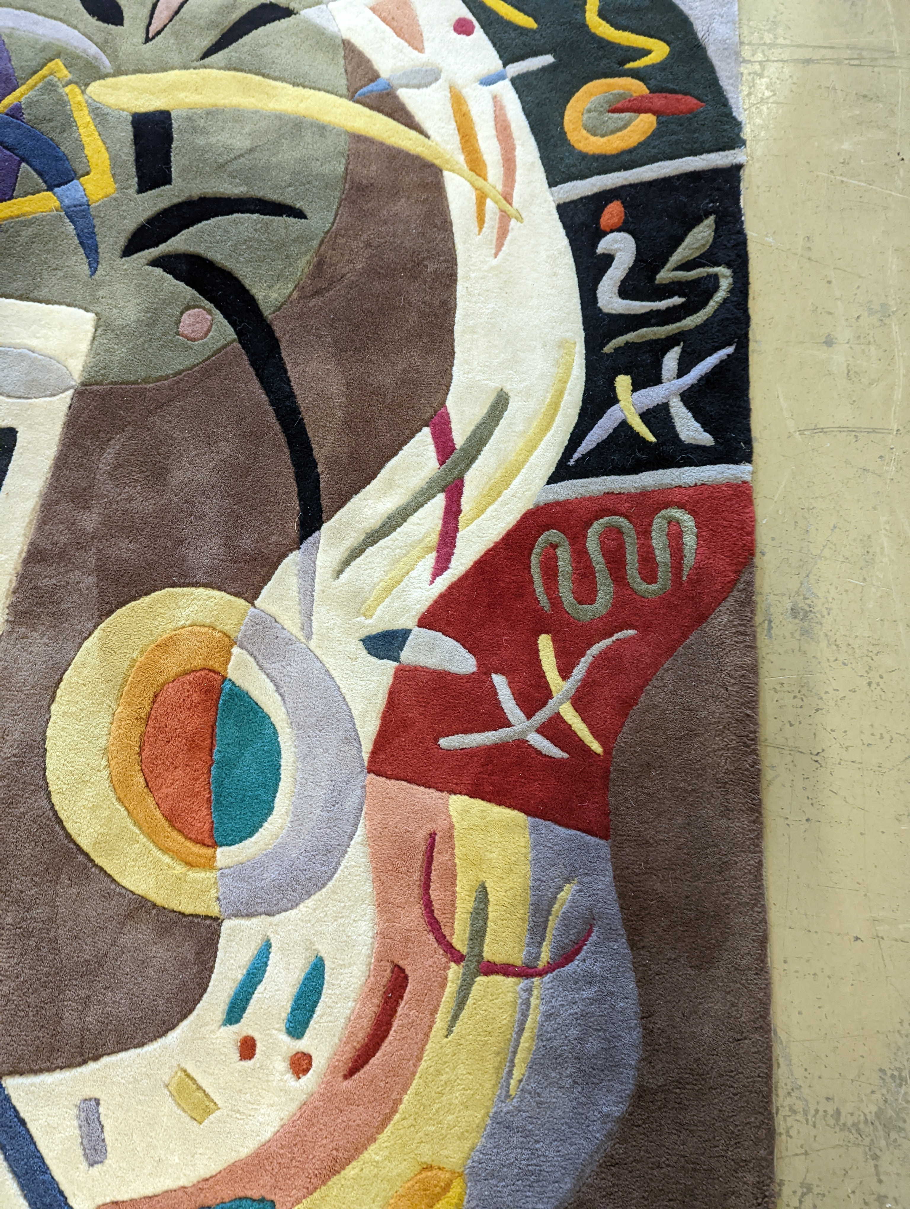 A contemporary Picasso inspired polychrome abstract pattern rug, 246 x 160cm